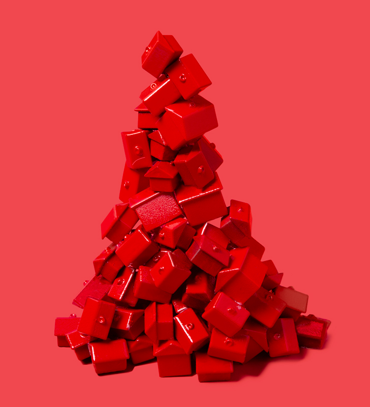 Pile of toy houses in red